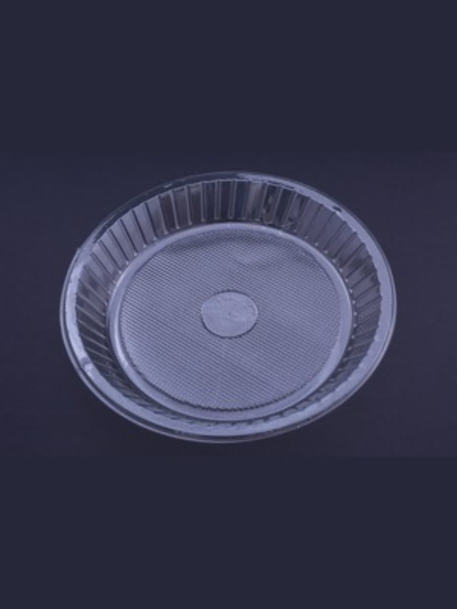 transparent, circular disposable plastic plate or food packaging tray 2